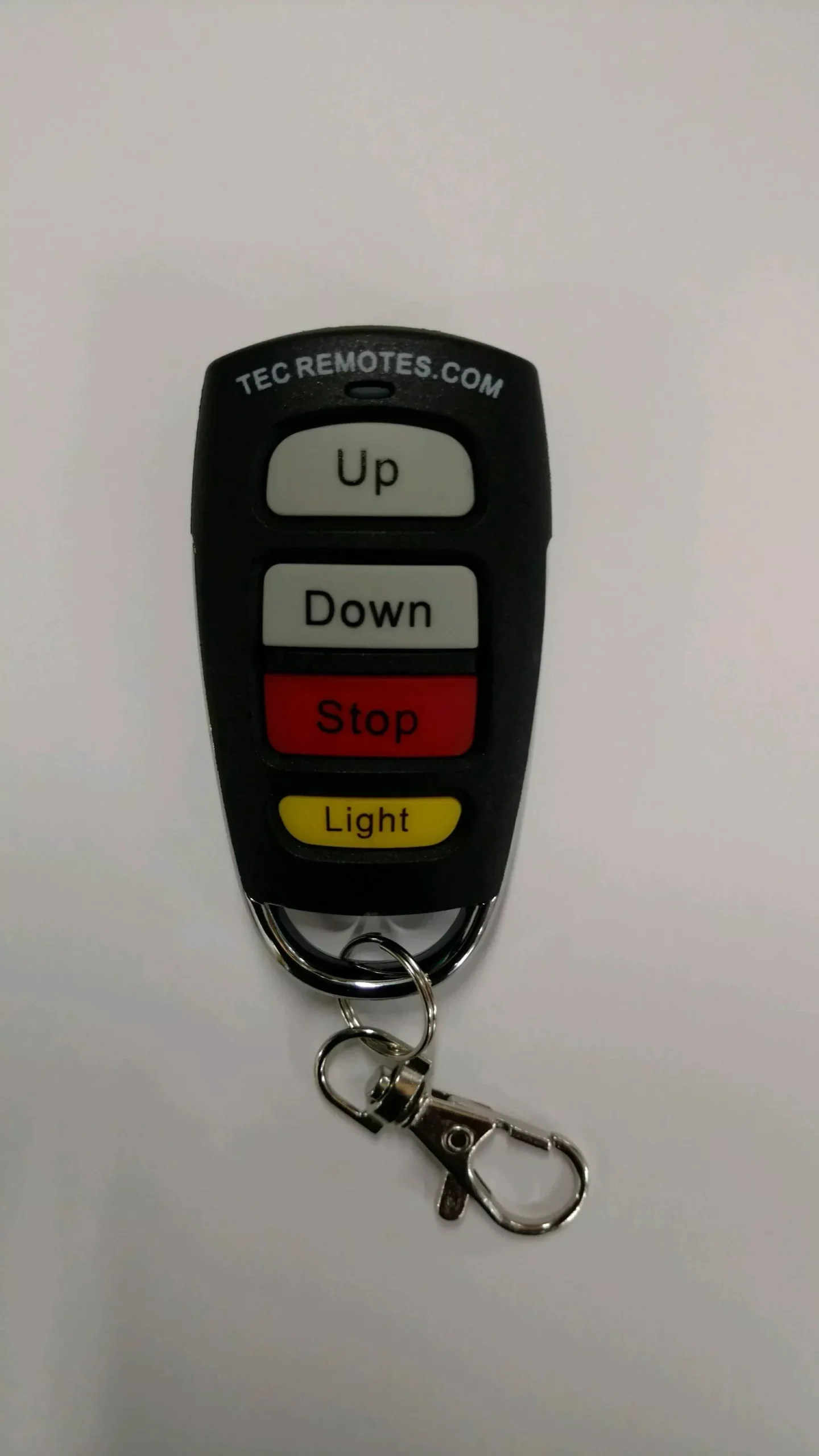 Boat Lift Distributors | TEC Remote Transmitter | Handheld Water-Resistant Remote | Dimensions 2″×2″×0.25″ | Range Up to 300 ft | For TEC Boat Lift Systems (2015+)