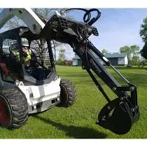 Paladin Bradco Backhoe | 73″ Digging Depth | Optional Fixed Thumb | 10″–24″ Bucket Options | 15-25 GPM | For Skid Steer Loaders