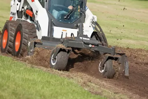 Top Dog Attachments Soil Conditioners / Power Rakes | Manual & Hydraulic Angle | Width 72″ & 84″ | 13-37 GPM | For Skid Steers